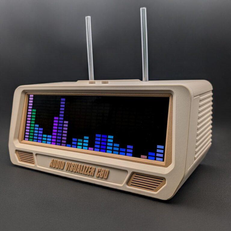 Visualizer C90 plugged into a USB power source with vibrant ambient lighting effects