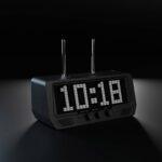 The Audio Visualizer Pro shows 10:18 in bold white digits on its LED display, set within a sleek, black speaker-panel background.