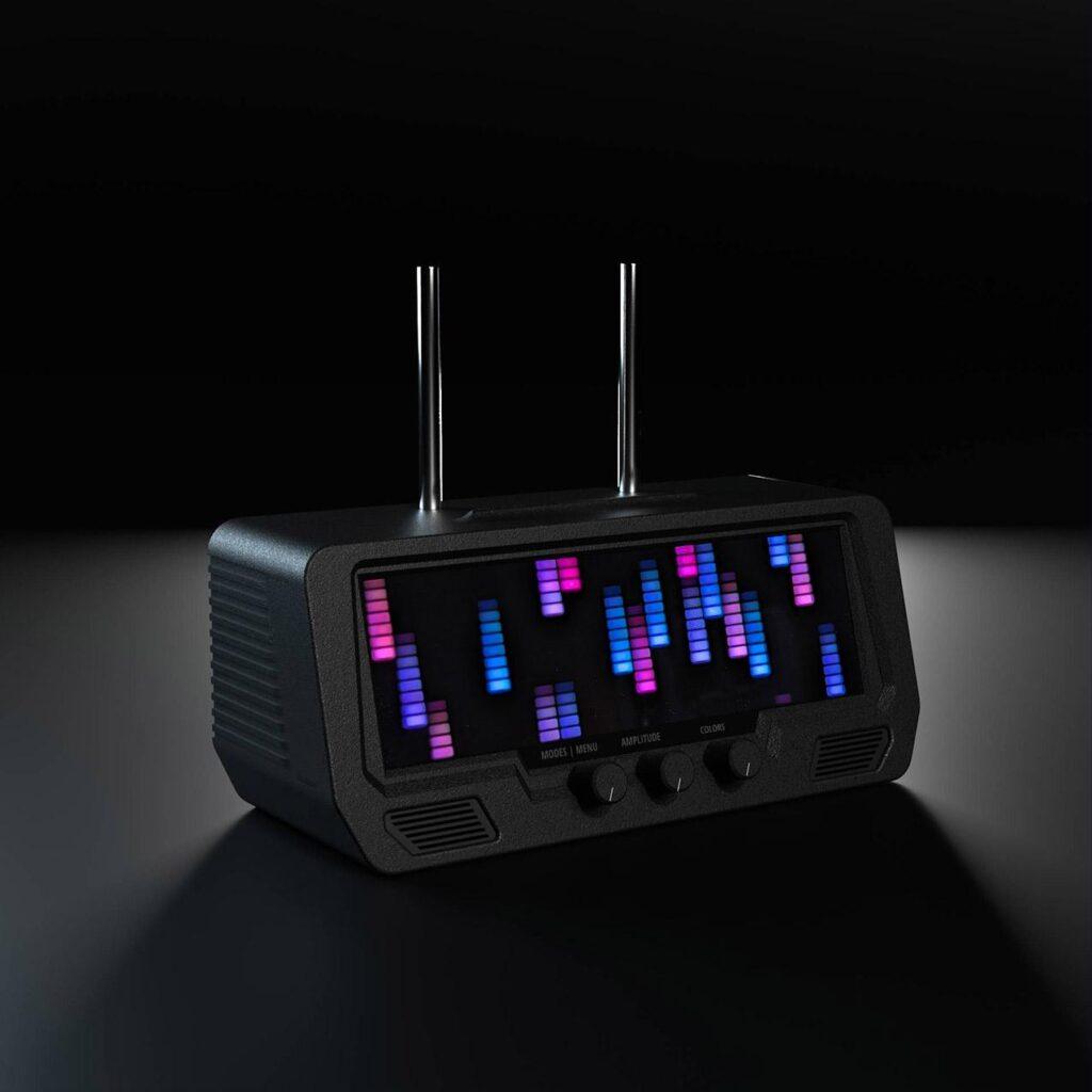 The Audio Visualizer Pro is a black synth module with dual antennas, three rotary dials, and a digital LED equalizer display.