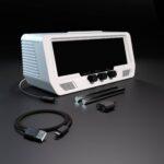 The Audio Visualizer Pro is a white rackmount unit with a large LED display, rotary encoders, input/output jacks, and patch cables neatly arranged in front.