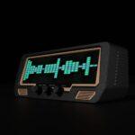 The Audio Visualizer Pro is a retro-style device with EQ sliders, rotary control knobs, vintage VU meters, and a green waveform display.