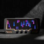 The Audio Visualizer Pro is a rackmount unit with a digital LED display showing blue and purple VU bars, plus three rotary dials: Modes | Menu, Amplitude, and Colors.