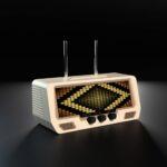 The Audio Visualizer Pro is a retro-style radio with three rotary dials, LED VU meter, and a diamond-pattern digital EQ display.