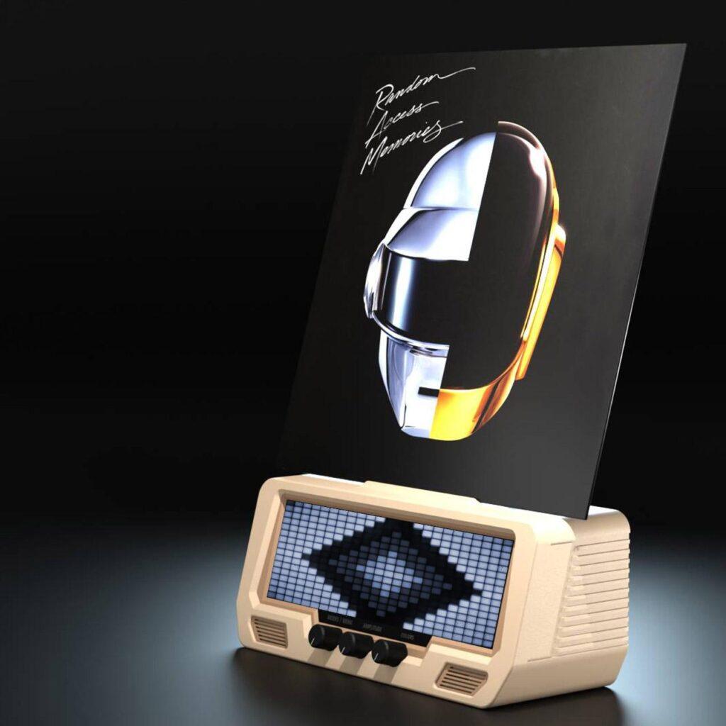 An Audio Visualizer Pro with spectrum analyzer shows a vinyl of Daft Punk’s “Random Access Memories” on a retro turntable with digital VU meters, set against a dark background.