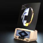 An Audio Visualizer Pro with spectrum analyzer shows a vinyl of Daft Punk’s “Random Access Memories” on a retro turntable with digital VU meters, set against a dark background.