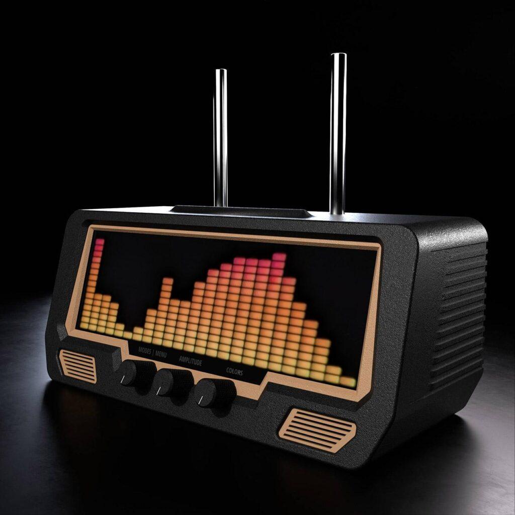 A retro-style radio with dual antennas, stereo speakers, digital equalizer display, and LED sound level meters on the front panel.