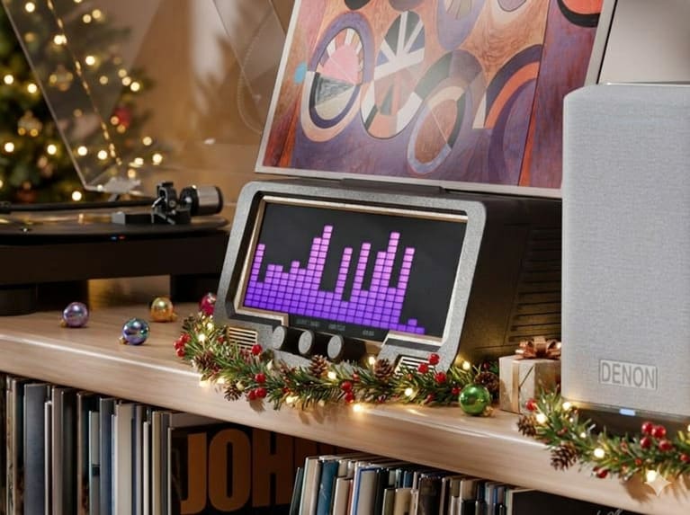 The Audio Visualizer Pro is a modern black radio...